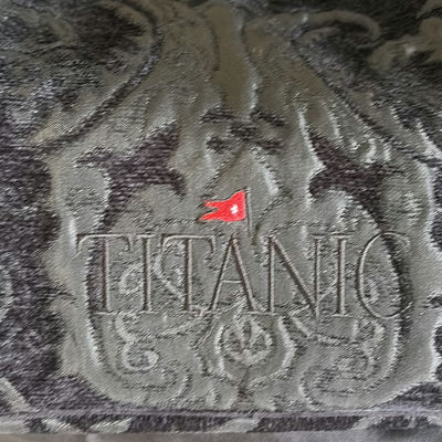 Titanic-pattern textile, Atenti bag, Polo patch, Texas star decor, and vintage lighting - Image 1 of 7