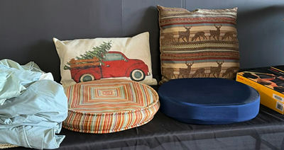 Decorative Pillows, Round Ottomans, Bedding, and Kodak EasyShare S730 Box - Image 1 of 5