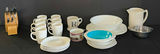 White ceramic dinnerware set with mugs, bowls, plates, and kitchen accessories - thumbnail 1 of 9