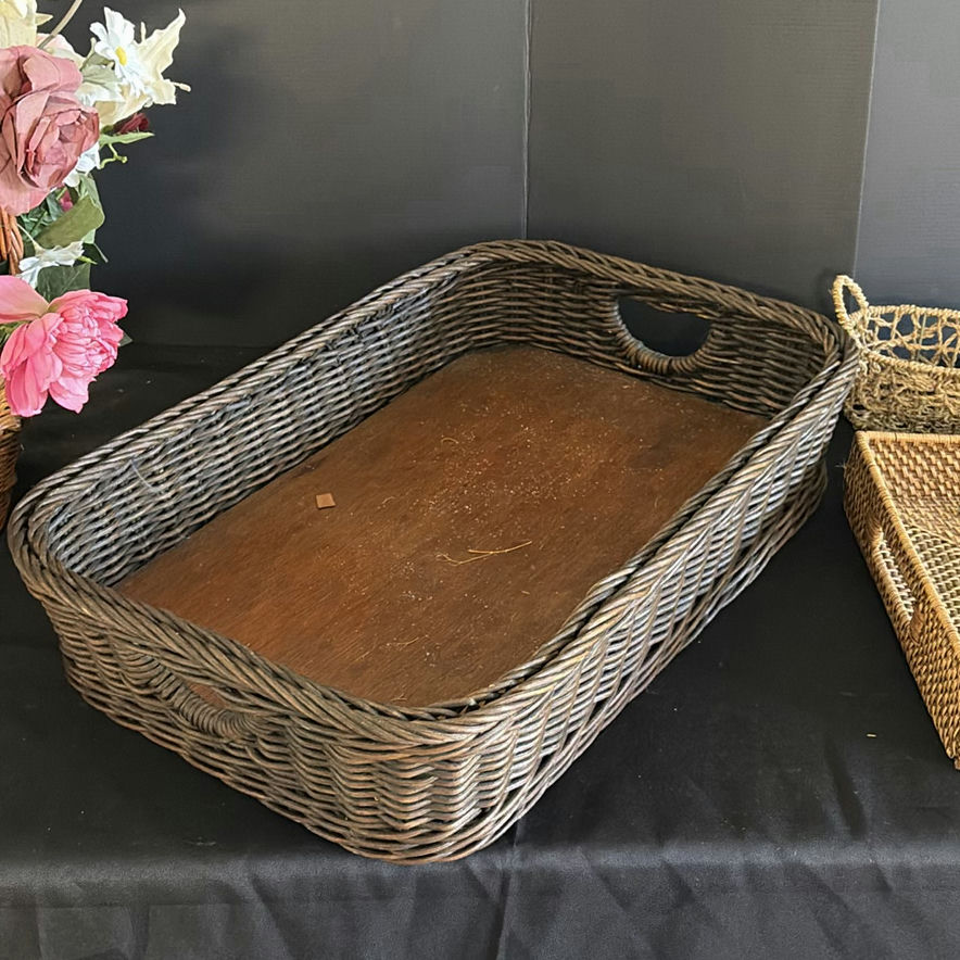 Wicker baskets with a floral arrangement - image 2 of 4