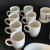 White ceramic dinnerware set with mugs, bowls, plates, and kitchen accessories - thumbnail 3 of 9
