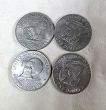Four Eisenhower One Dollar Coins - thumbnail 1 of 5