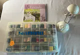 Collection of Thimbles, Thread Spools, and Storage Boxes - thumbnail 10 of 20