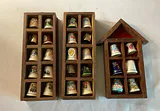 Collection of Thimbles, Thread Spools, and Storage Boxes - thumbnail 2 of 20
