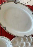 Vintage porcelain plates with floral rims, metal serving trays, egg tray, and ornate flatware set - thumbnail 2 of 13