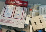 Assorted lighting switches, dimmers, wall plates, and wiring hardware - thumbnail 3 of 5