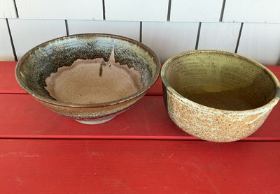 Earth Toned Pottery, Matching pillow - Image 1 of 6