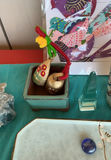 Assorted decorative Altar items: ceramics, artwork, crystals, and Tibetan prayer flags - thumbnail 3 of 9