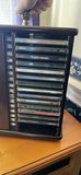 Collection of CDs in a cabinet - thumbnail 3 of 4