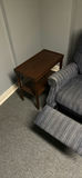 Vintage wooden media cabinet with CRT TV, blue upholstered recliner, end table, and landscape painting - thumbnail 3 of 7