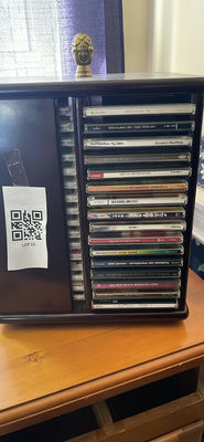 Collection of CDs in a cabinet - Image 1 of 4