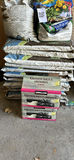 Stacked garden soil bags and garbage bags - thumbnail 1 of 4