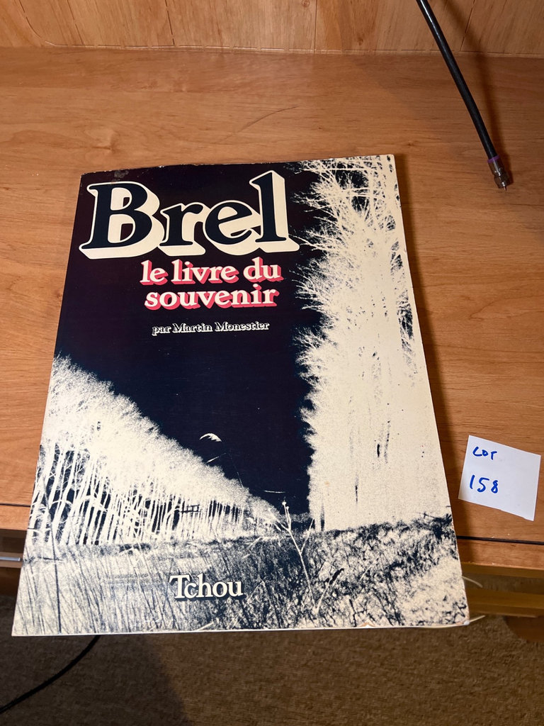 Black-and-white photography book pages and a Brel photobook - image 1 of 4