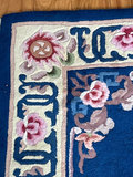 Blue floral rug with fringe and central motif - thumbnail 4 of 5