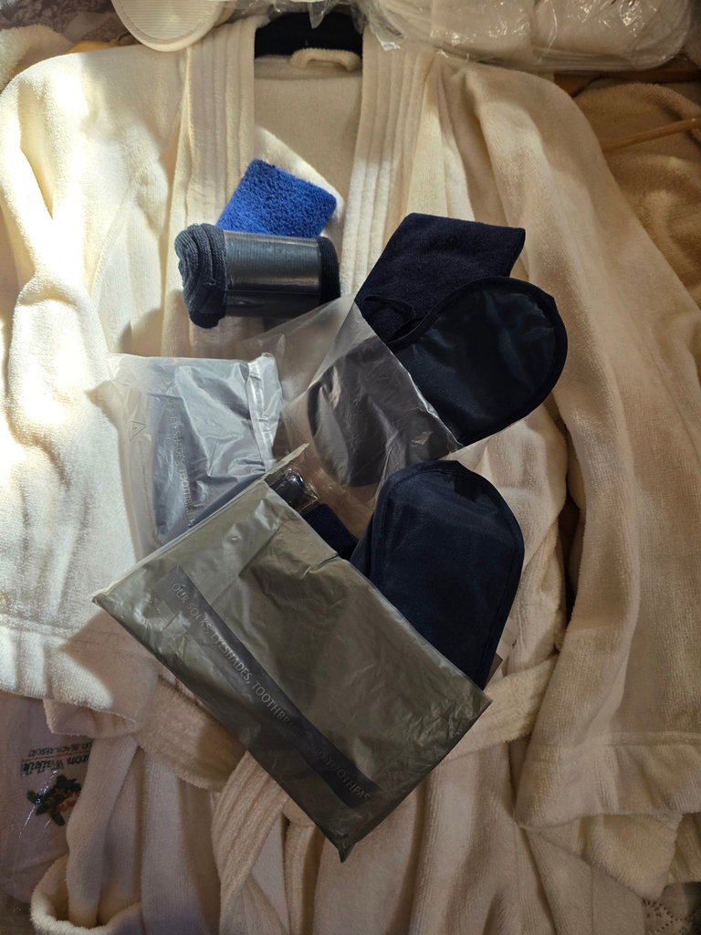 Assorted hotel bathrobes and slippers - image 11 of 15