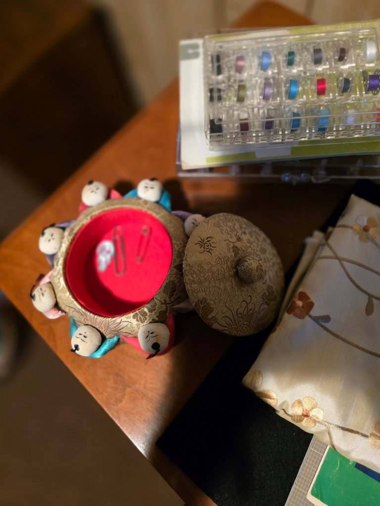 Singer sewing machine with knitting books and craft supplies - image 18 of 21