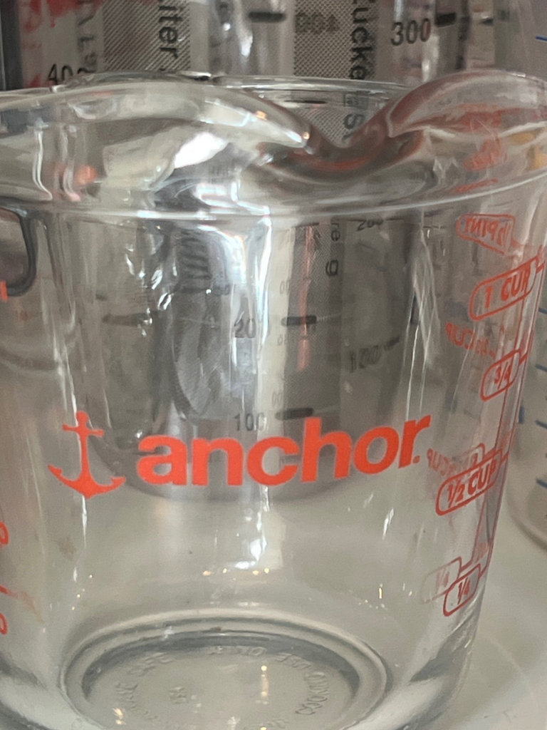 Kitchenware collection: measuring cups, jars, bakeware, and a handheld mixer - image 3 of 7
