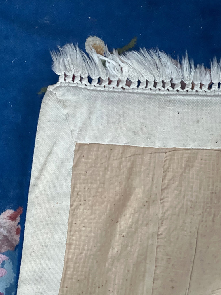 Blue floral rug with fringe and central motif - image 2 of 5