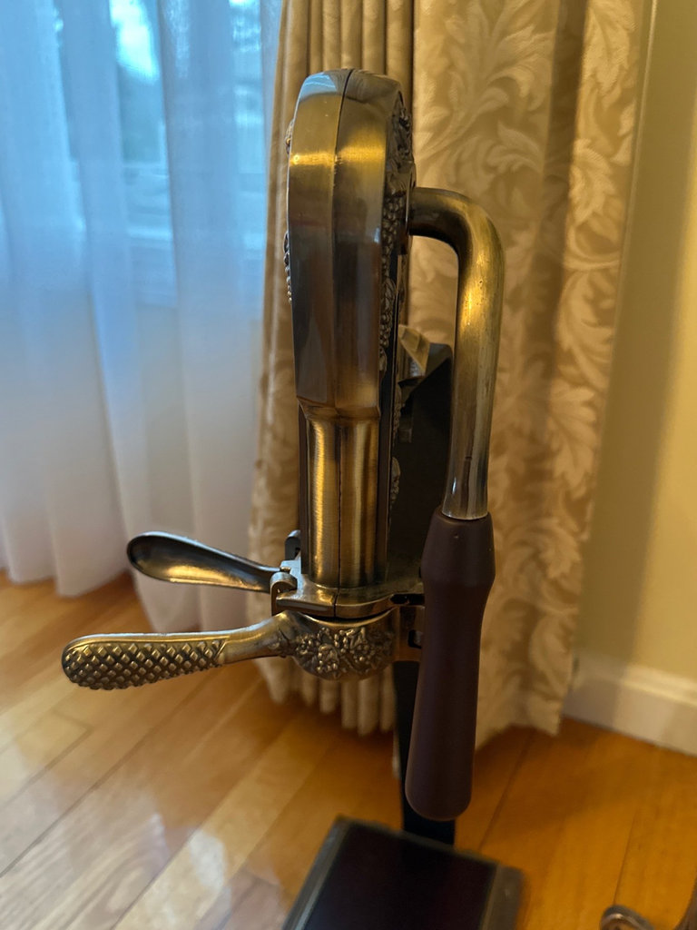 Vintage lever-style wine opener on decorative stand with wine rack - image 5 of 6
