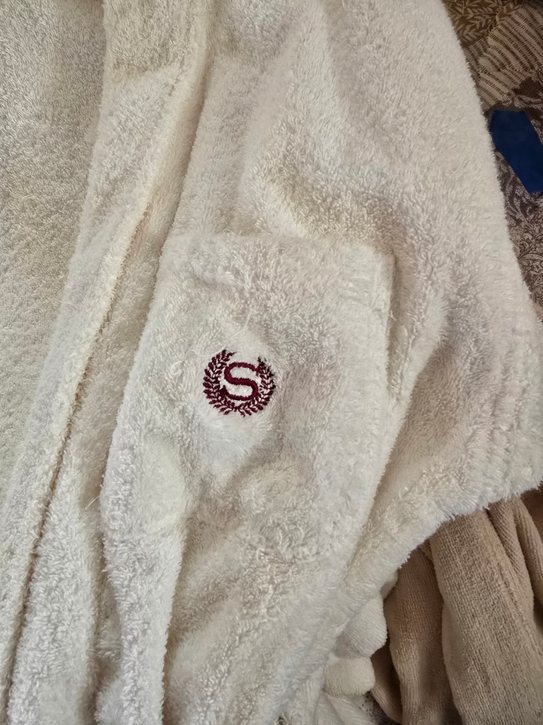 Assorted hotel bathrobes and slippers - image 2 of 15