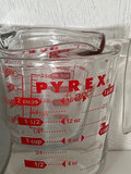 Kitchenware collection: measuring cups, jars, bakeware, and a handheld mixer - thumbnail 6 of 7