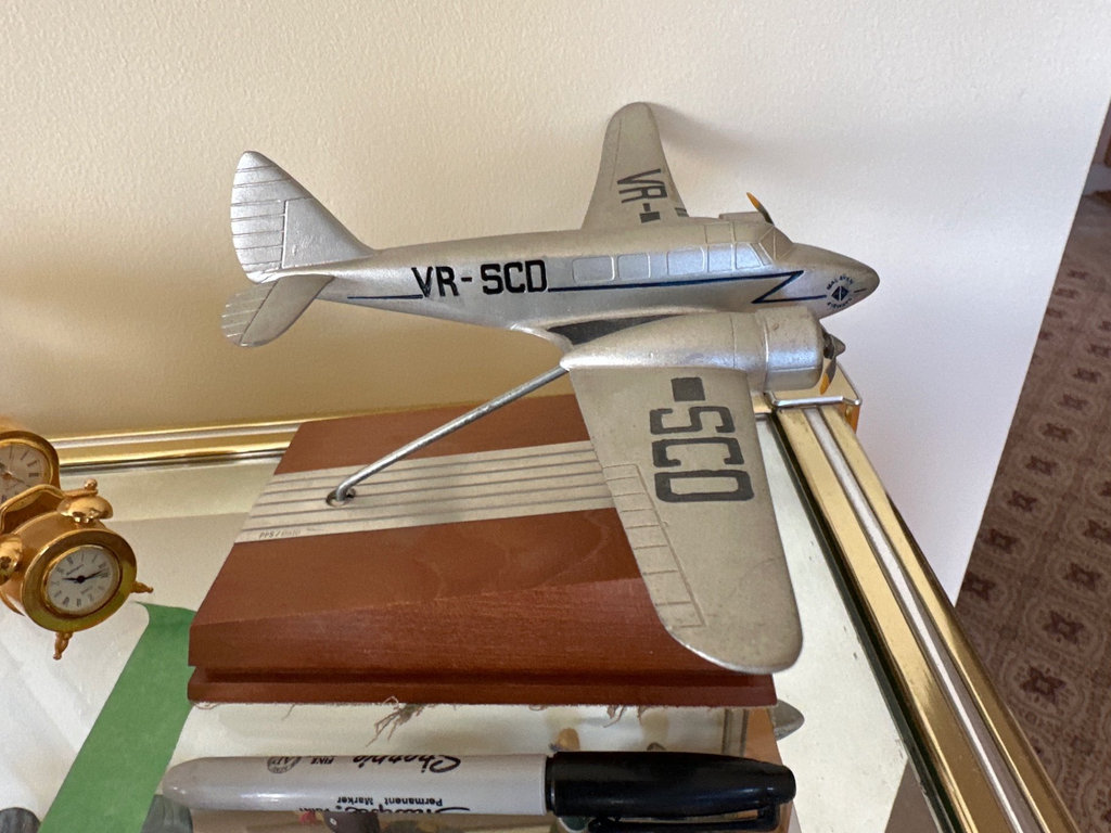 Crystal awards and a model airplane trophy - image 1 of 9