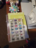 Singer sewing machine with knitting books and craft supplies - thumbnail 4 of 21