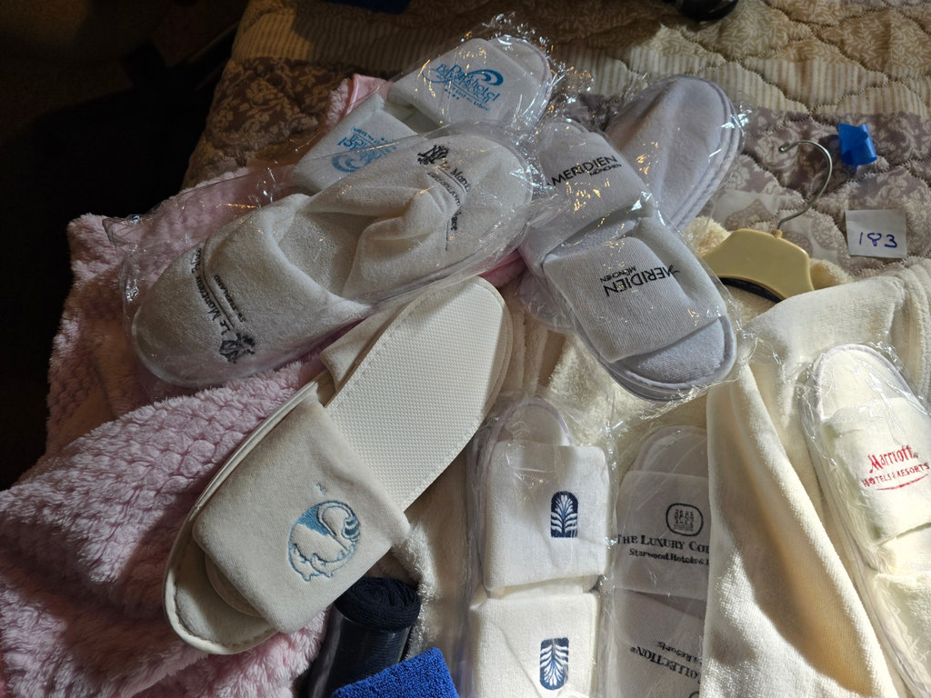Assorted hotel bathrobes and slippers - image 14 of 15