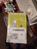 Singer sewing machine with knitting books and craft supplies - thumbnail 5 of 21