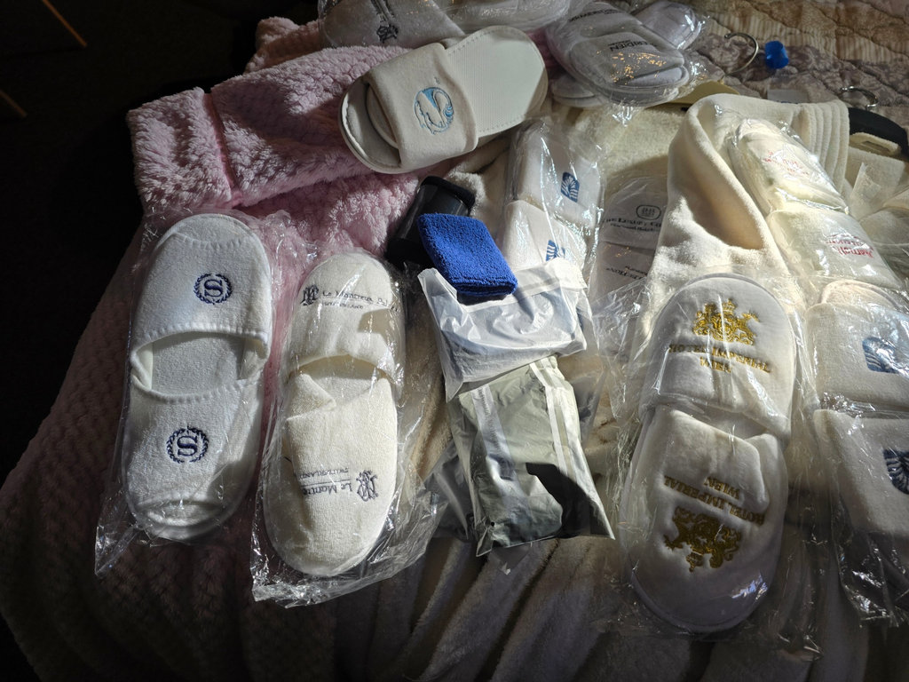 Assorted hotel bathrobes and slippers - image 13 of 15