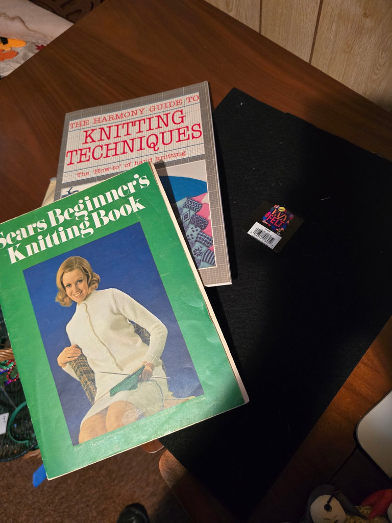 Singer sewing machine with knitting books and craft supplies - image 8 of 21