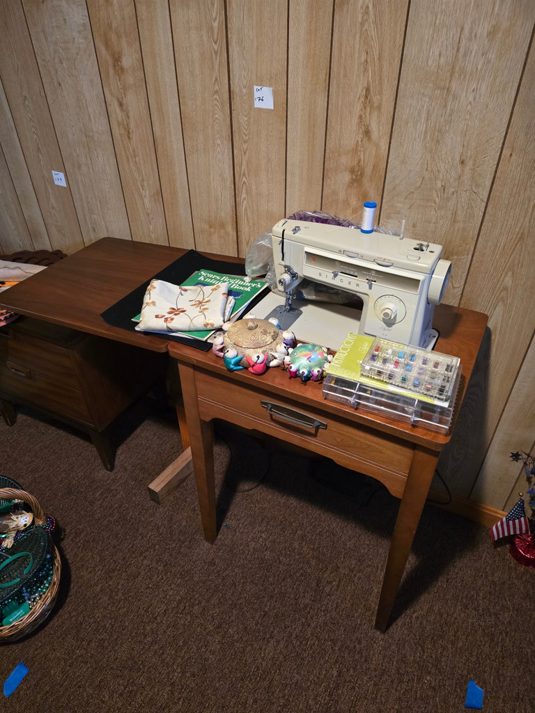 Singer sewing machine with knitting books and craft supplies - image 1 of 21