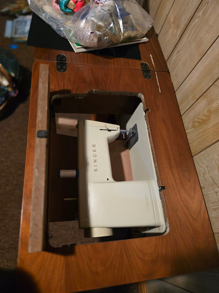 Singer sewing machine with knitting books and craft supplies - image 12 of 21