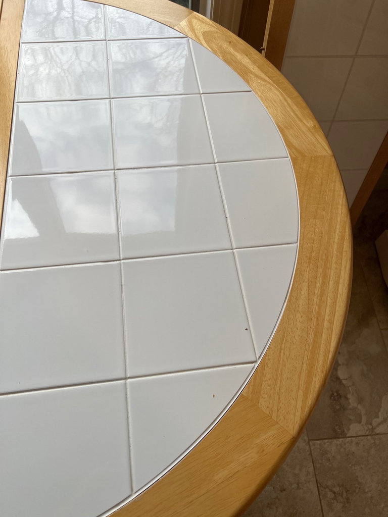 Round tile-top dining table with pedestal base - image 3 of 6