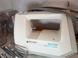 Kitchenware collection: measuring cups, jars, bakeware, and a handheld mixer - thumbnail 2 of 7