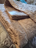 Stacked quilts and blankets - thumbnail 4 of 8