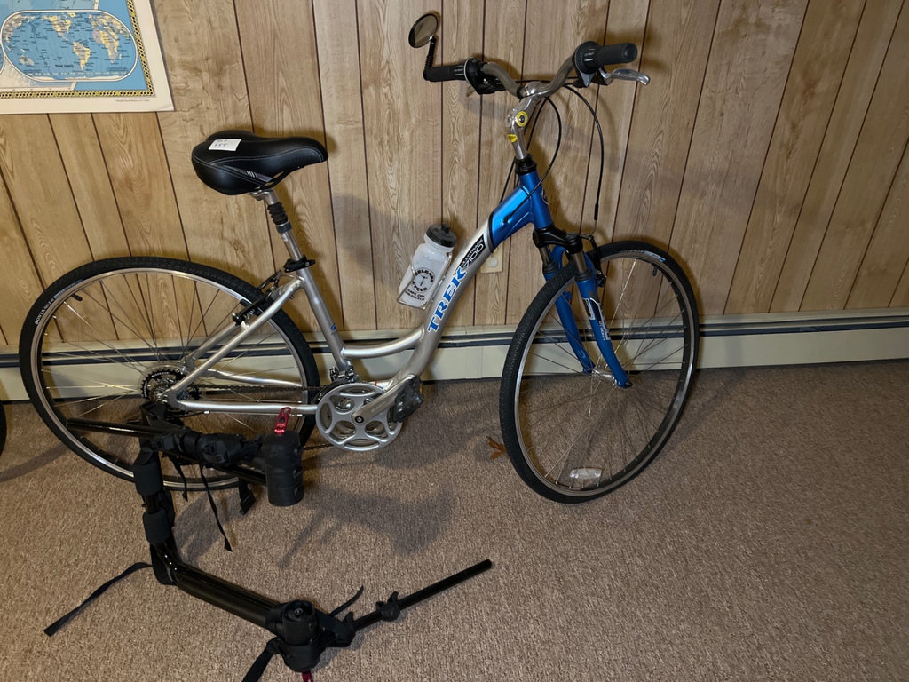 Trek 7000 Aluminum Hybrid Bicycle with Water Bottle and Portable Bike Trainer - image 1 of 7