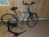 Trek 7000 Aluminum Hybrid Bicycle with Water Bottle and Portable Bike Trainer - thumbnail 1 of 7