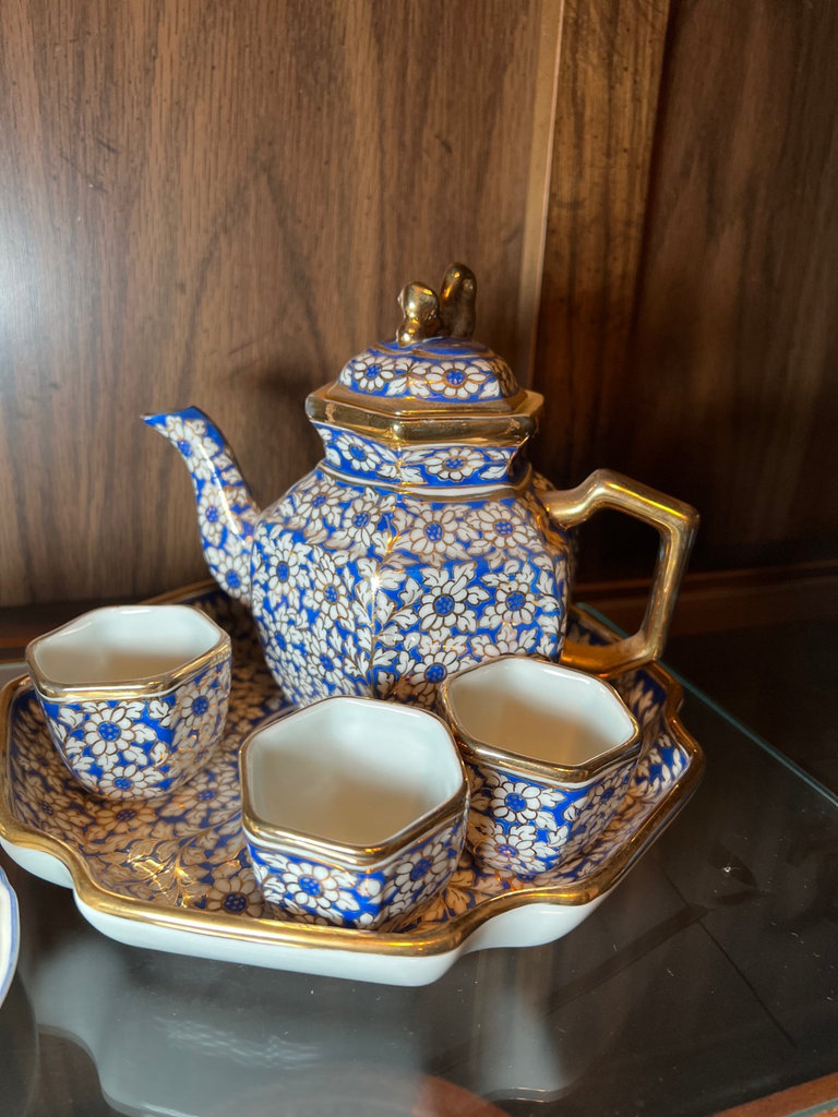 Porcelain tea set with blue and floral designs - image 6 of 10