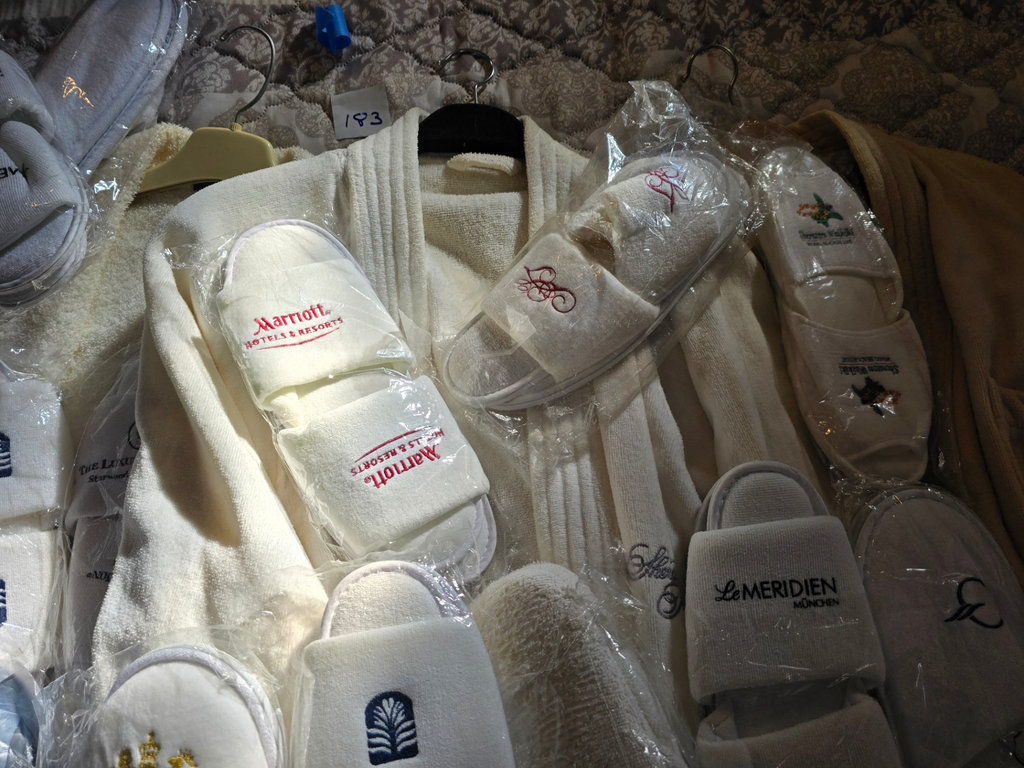Assorted hotel bathrobes and slippers - image 12 of 15