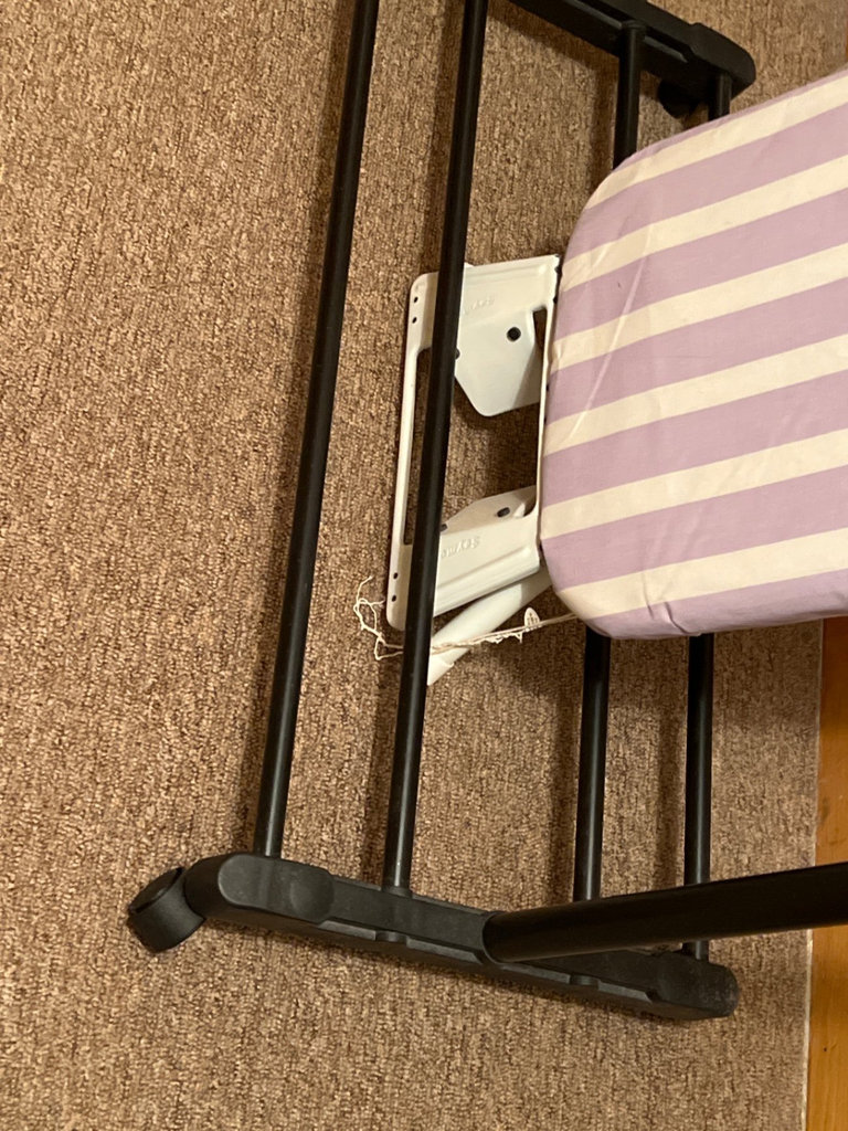 Freestanding ironing board on metal clothes rack - image 4 of 6