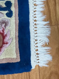 Blue floral rug with fringe and central motif - thumbnail 3 of 5