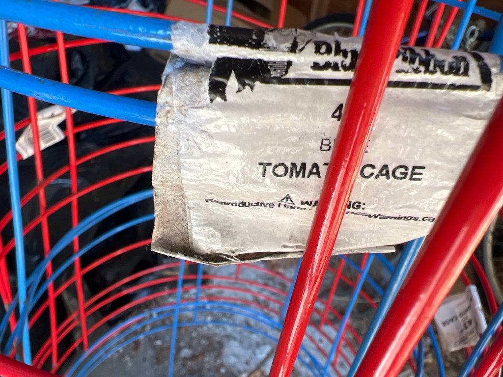 Red and blue metal tomato cages - image 2 of 3