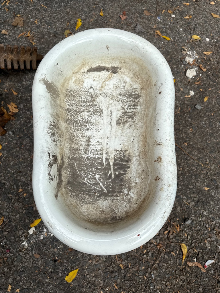 Weathered enamel infant tub basin on rusted folding stand - image 6 of 9