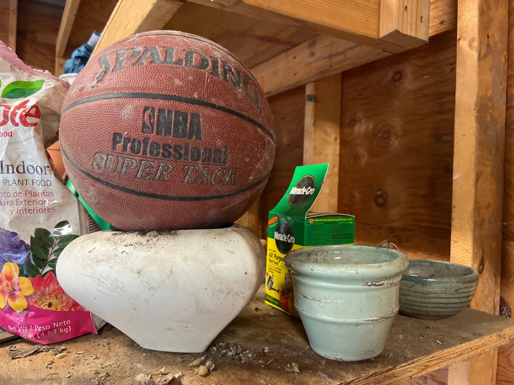 Assorted yard and garden items: planters, plant food, and a basketball - image 1 of 10