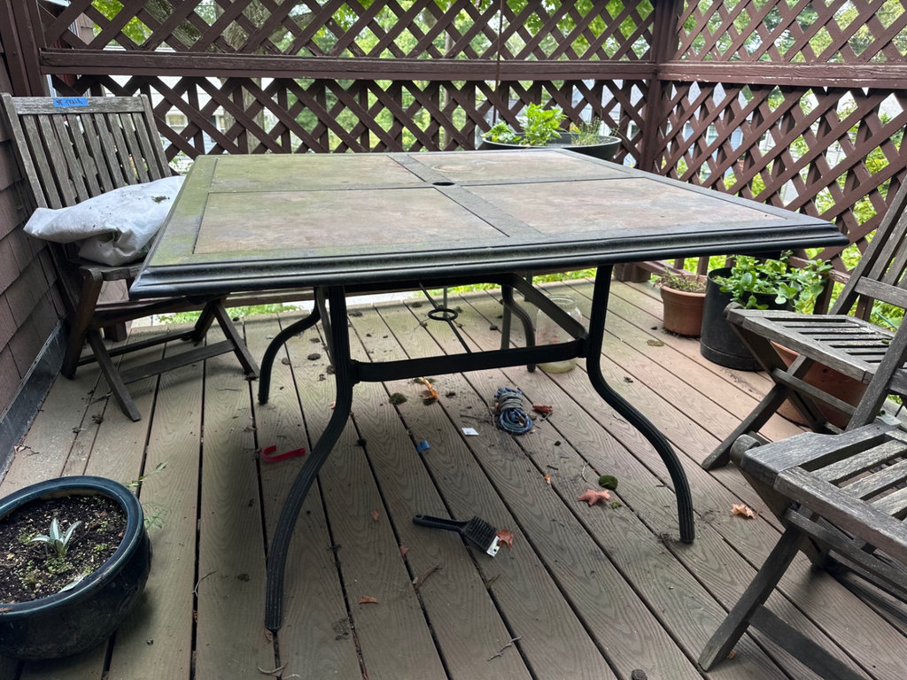 Outdoor black metal dining table with four-panel top - image 4 of 4