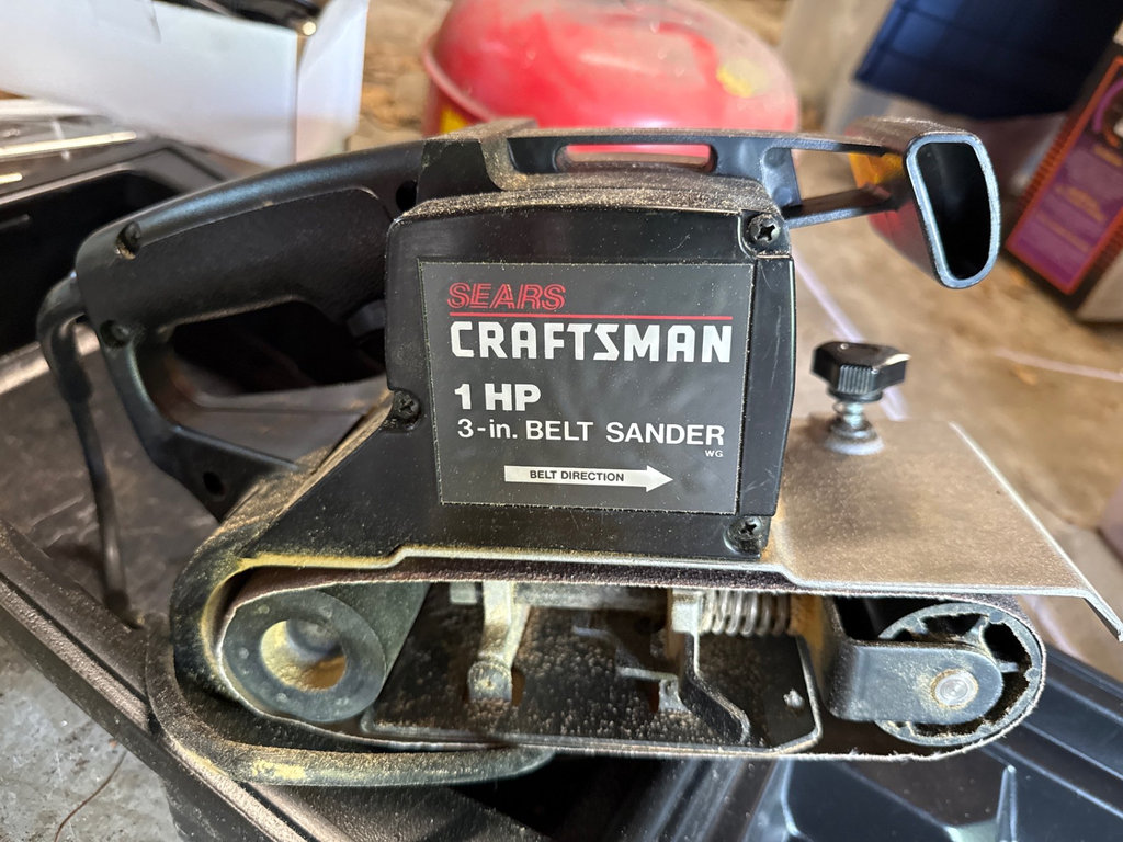 McCulloch chainsaw and Sears Craftsman belt sander with rotisserie kit and safety can - image 1 of 15