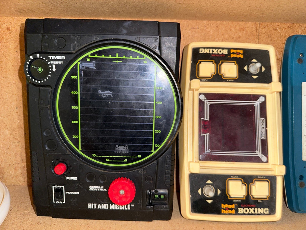 Vintage comics and handheld electronic toy games - image 7 of 7