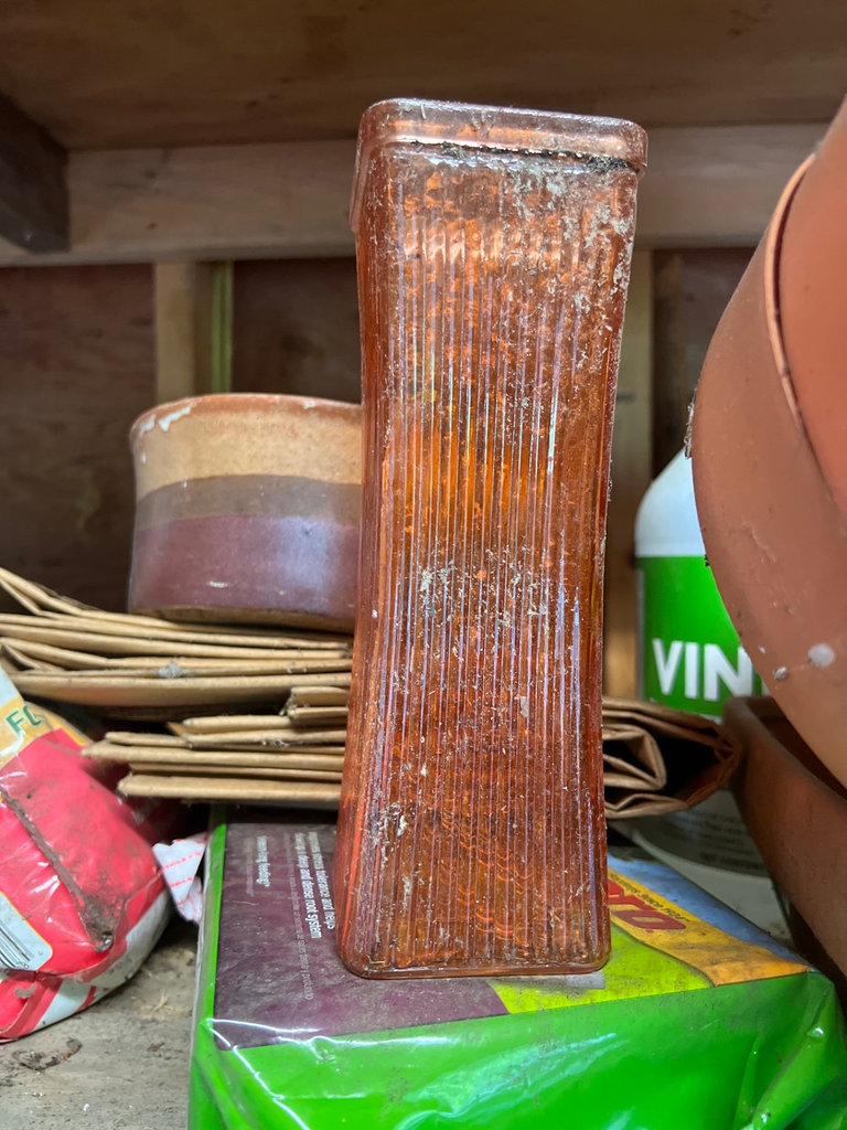 Assorted yard and garden items: planters, plant food, and a basketball - image 7 of 10