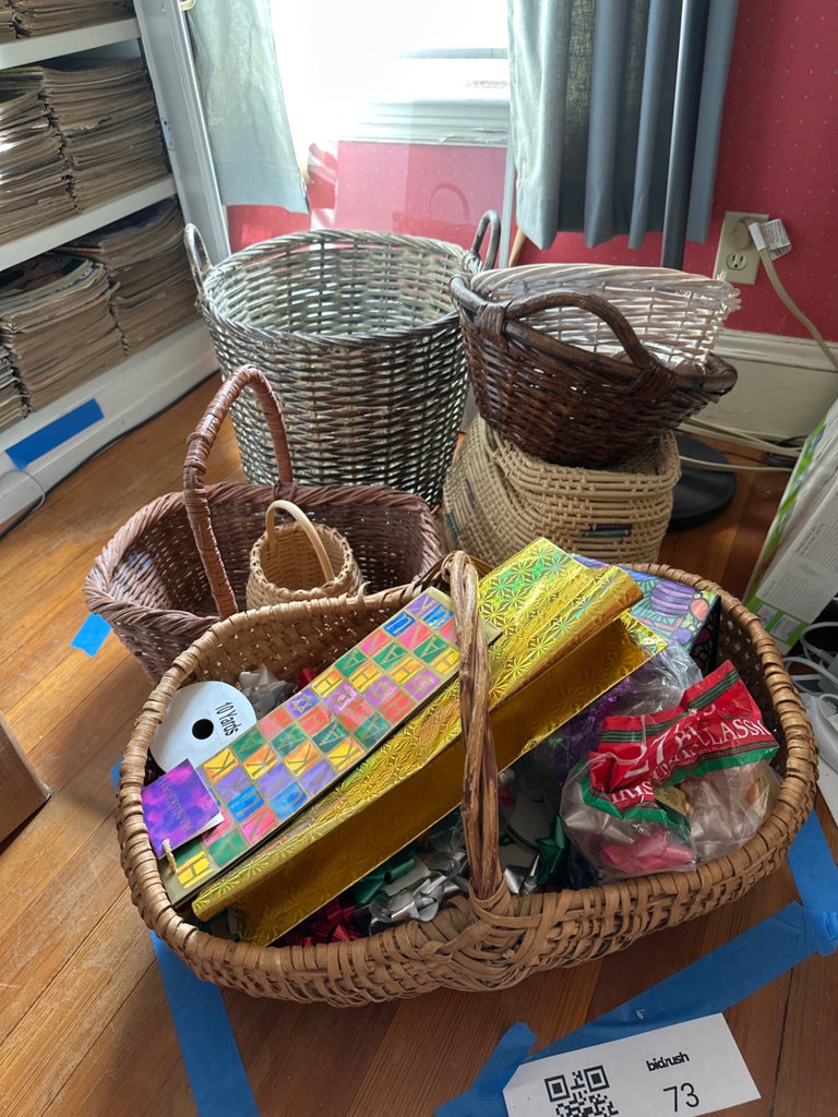 Assorted wicker baskets with gift wrap supplies - image 1 of 7